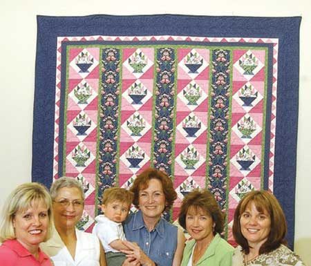 Basket of Hope quilt put to work at the Taste of MH