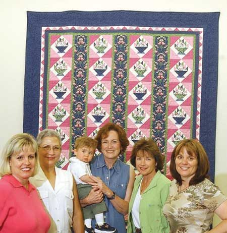 Basket of Hope quilt put to work at the Taste of MH