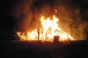 Flames Consume Abandoned Home