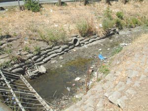 EYESORE OF THE WEEK: Drainage Canal by VTA Station Has More Than Water in it