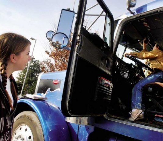 Students help on set of film