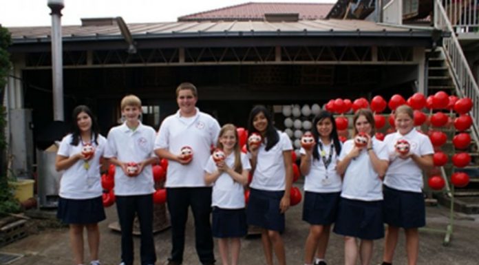 Mizuho delegates meet obstacles and embrace warm greetings