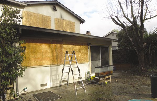 Neighbors rescue woman from burning home