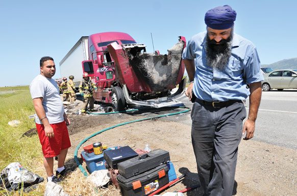 Big rig totaled after engine catches fire