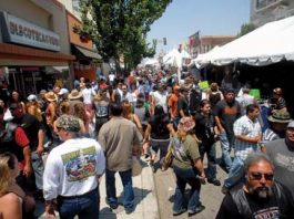 Biker event supporters rally at council meeting