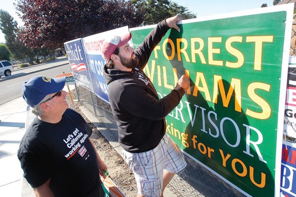 Candidates, water district remove some illegal signs