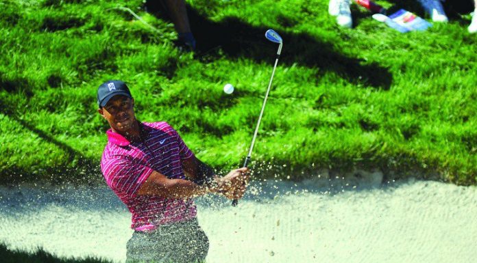 Tiger Woods four shots behind Charlie Wi at Pebble Beach