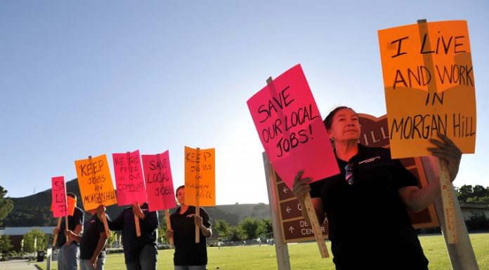 Janitor swept out the door