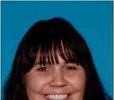 Mom in grocery theft emotional in court