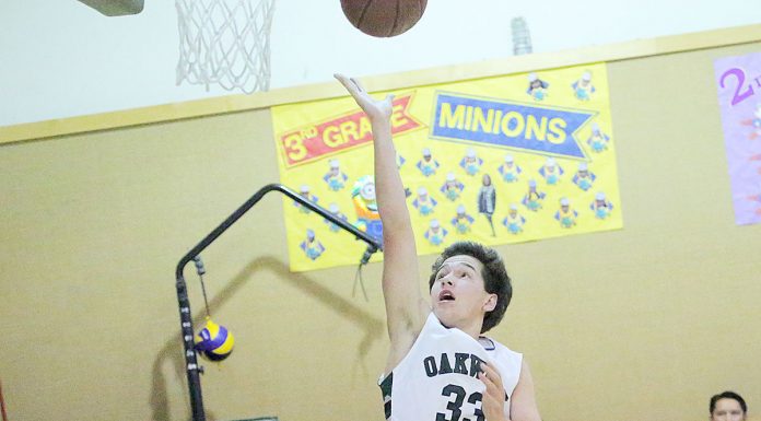 Oakwood boys basketball team looks to youth to aid vets