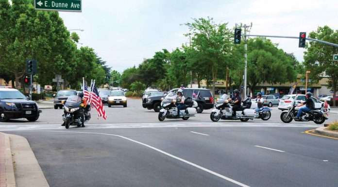 Ceremony celebrates first hoisting of flags