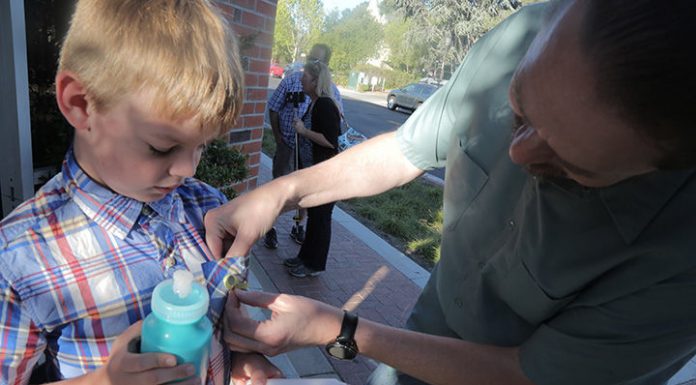 Vigil lights candle for family of injured accident victims