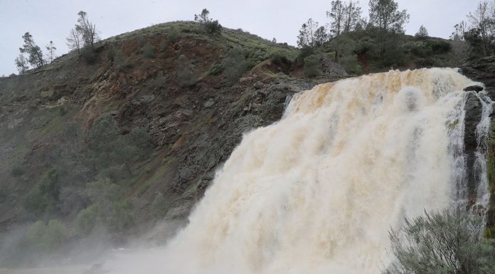 Photos and video: Anderson Reservoir reaches spillway