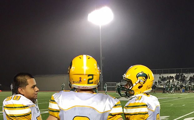 Brothers Cole and Drake both carry the ball for the Acorns