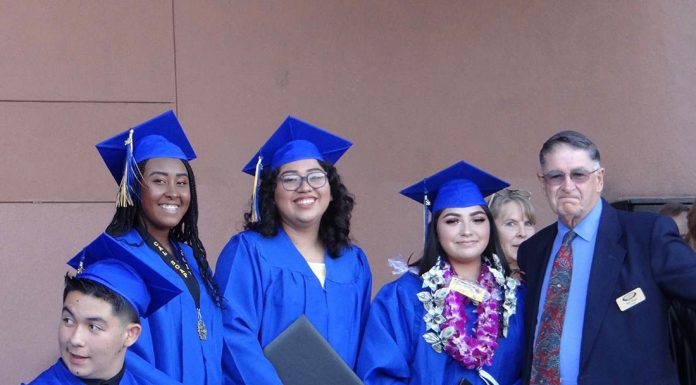 Photos: Graduates embrace special day together