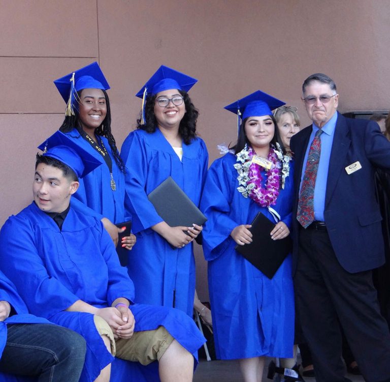 Photos: Graduates embrace special day together