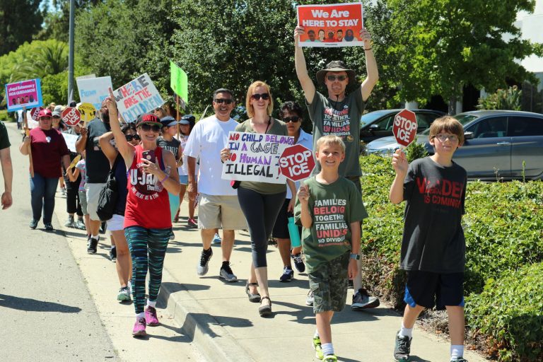 Locals partake in ‘Families Belong Together’ rally