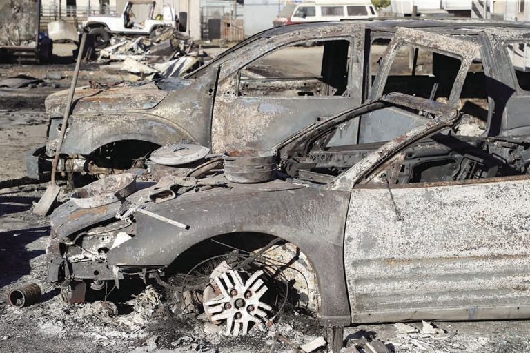 Couple returns to ashes