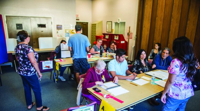 Poll workers train for a one-day job