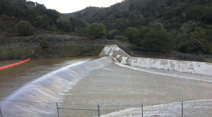Rain sends Uvas over spillway