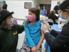 Photos: Vaccine clinics now a ‘family affair’