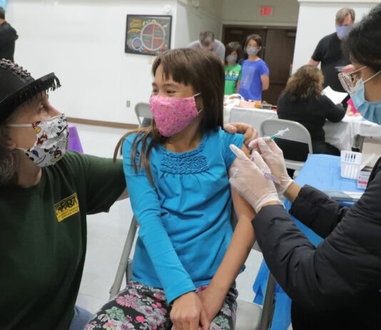 Photos: Vaccine clinics now a ‘family affair’
