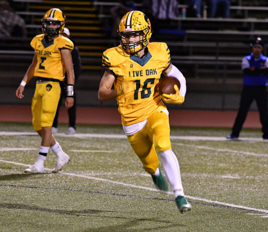 Live Oak football team marches all over Saints