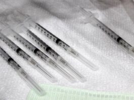 Boosters required for healthcare workers covid-19 vaccine syringe dose booster