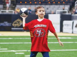 Boy battling cancer is honored at Panthers game