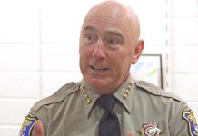 Sheriff Bob Jonsen opens re-election campaign with a book and a song