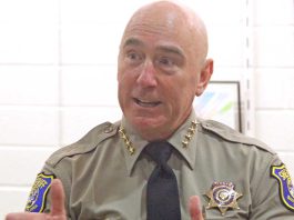 Sheriff Bob Jonsen opens re-election campaign with a book and a song