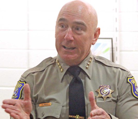 Sheriff Bob Jonsen opens re-election campaign with a book and a song