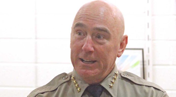 Sheriff Bob Jonsen opens re-election campaign with a book and a song